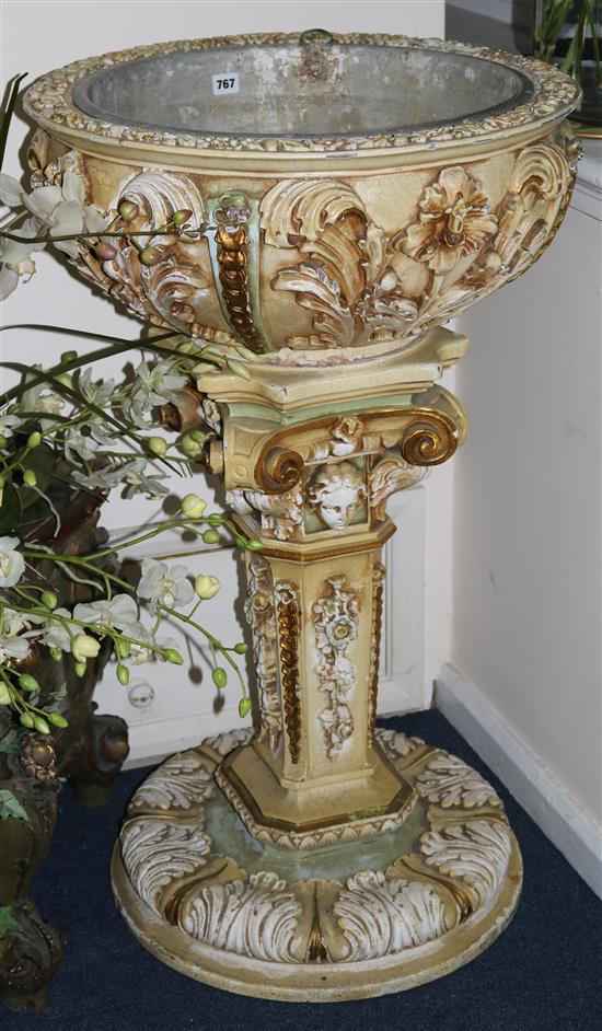 A large composition jardiniere H.97cm